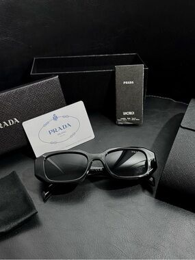 Prada Black Sunglasses with Dark Lenses